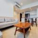 Modern Look 3BR with Branz BSD City Apartment By Travelio Tangerang - Photo 1