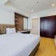 Modern Look 3BR with Branz BSD City Apartment By Travelio Tangerang - Photo 3