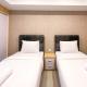 Simply Look Studio at 21st Floor De Prima Apartment By Travelio, Medan - Foto 1