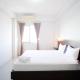 Simple 2BR with Extra Bed at Menara Rungkut Apartment By Travelio Surabaya - Photo 5