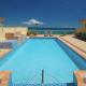 Beachside famous resort, pool, night life,full AC