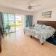 Brisas Shores 07 Beachfront Condo, Pool and garden area, Zona Hotelera Cancun, Cancún - Foto 6