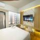 Minimalist and Homey Studio The Alton Apartment By Travelio, Semarang - Fotografie 4