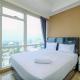 Modern Look and Comfy 2BR at Menteng Park Apartment By Travelio
