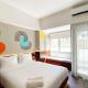 Homey Studio No Kitchen at Gateway Park LRT City Jatibening Apartment By Travelio Bekasi - Photo 1