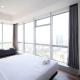 Minimalist with Beautiful View 2BR at Grand Sungkono Lagoon Apartment By Travelio Surabaja - Fotografie 5