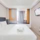 Cozy Stay Studio at Collins Boulevard Apartment By Travelio Tangerang - Fotografie 2