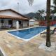 Casa Massaguaçu ampla com Piscina, lazer e ar condicionado perto praia, Caraguatatuba - Fotografie 1