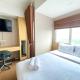 Cozy and Nice Studio at The Oasis Cikarang Apartment By Travelio, Cikarang - Fotografie 2
