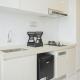 Cozy and Nice Studio at Sky House BSD Apartment By Travelio, Тангеранг (фото 9)