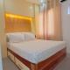 Homestay at Phirst Park Homes Tanza, Tanza (fotografie 10)