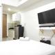 Simply Homey Studio at Vida View Apartment By Travelio, Pampang - Fotografie 3