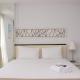 Comfort and Minimalist Studio at Azalea Suites Apartment By Travelio