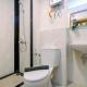 Stunning 1BR at Grand Kamala Lagoon Apartment By Travelio Bekasi - Fotografie 10