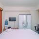 Spacious 1BR at Grand Kamala Lagoon Apartment By Travelio Bekasi - Photo 2