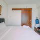 Spacious 1BR at Grand Kamala Lagoon Apartment By Travelio Bekasi - Photo 3