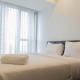 Exquisite 2BR at Branz BSD Apartment By Travelio Tangerang - Photo 1