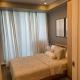 KYH STAYCATION 2BR by Azure Residences Near Airport, Manila - Fotografie 5