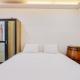 Comfy and Warm Studio Serpong Greenview Apartment By Travelio, Tangerang - Fotografie 1