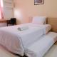 Great Deal Studio at Pinewood Apartment By Travelio