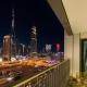 Premium Two-Bedroom Apartment with Private Balcony & Full Burj Khalifa Views by Al Fannan Holiday Homes, Dubaï - Photo 1