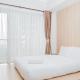 Clean and Elegant 1BR at The Oasis Apartment By Travelio, Cikarang - Photo 1