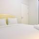 Clean 2BR Apartment at 12th Floor Springlake Summarecon Bekasi By Travelio