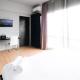 Homey Studio No Kitchen at Grand Darmo Suite Apartment By Travelio Surabaja - Zdjęcie 4