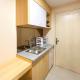 Minimalist Studio at De Prima Apartment Medan By Travelio, Medan - Foto 10
