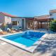 Holiday Home Ema with pool