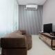 Clean and Cozy 1BR Apartment with Sofabed at Atlanta Residences By Travelio, Depok - Fotografie 2