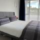 Totara Vale, Free Coffee, parking and wifi, near Glenfield Mall and highway 18,1, Auckland - Fotografie 1