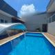 Casa de Hóspedes Jardim dos Pinheiros Piscina climatizada, アチバイア - 写真 1