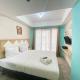 Modern and Comfy Studio Room at Grand Asia Afrika Apartment By Travelio