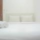 Cozy and Tidy 2BR at Signature Park Grande Apartment By Travelio