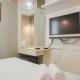 Comfort 1BR at The Mansion Kemayoran Apartment By Travelio Джакарта - Фото 7