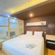 Spacious Studio Room at Gateway Ahmad Yani Cicadas Apartment By Travelio Bandung - Photo 1