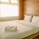 Comfort and Simple 2BR at Green Pramuka City Apartment By Travelio
