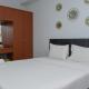 Comfort Studio at Patraland Urbano Apartment By Travelio Bekasi - Fotografie 3