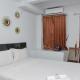 Comfort Studio at Patraland Urbano Apartment By Travelio Bekasi - Fotografie 1