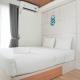 Modern Studio with City View Amethyst Apartment By Travelio Jakarta - Photo 1