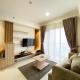 Cozy and Minimalist 2BR at 8th Floor The Oasis Cikarang Apartment By Travelio, Cikarang - Fotografie 3