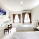 Modern Studio No Kitchen at Elvis Tower Apartment By Travelio, Cikarang (foto 5)