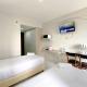 Modern Studio No Kitchen at Elvis Tower Apartment By Travelio, Cikarang (foto 4)