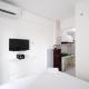 Compact and Tidy Studio at Puncak Dharmahusada Apartment By Travelio, Plosobegem (Foto 5)