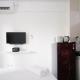 Compact and Tidy Studio at Puncak Dharmahusada Apartment By Travelio, Plosobegem (Foto 6)