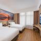 Shanghai Manhua Hotel-Provides free shuttle service to Disneyland, Shanghai - Foto 5