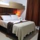 CONFORTO IMBATIVEL - 25 metros do MAR - 2 Quartos com AR CONDICIONADOS SPLIT, Air Fryer, WI-FI, Disney Plus, Star Plus, HBO Max, Guarda Sol, Cadeiras de Praia e Caixa Térmica - 8 pessoas com Muito Conforto - Melhor Localização!, ガラパリ - 写真 4