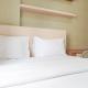 Cozy Stay 1BR at Green Pramuka City Apartment By Travelio