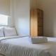 Comfy and Best View 2BR at Serpong Greenview Apartment By Travelio